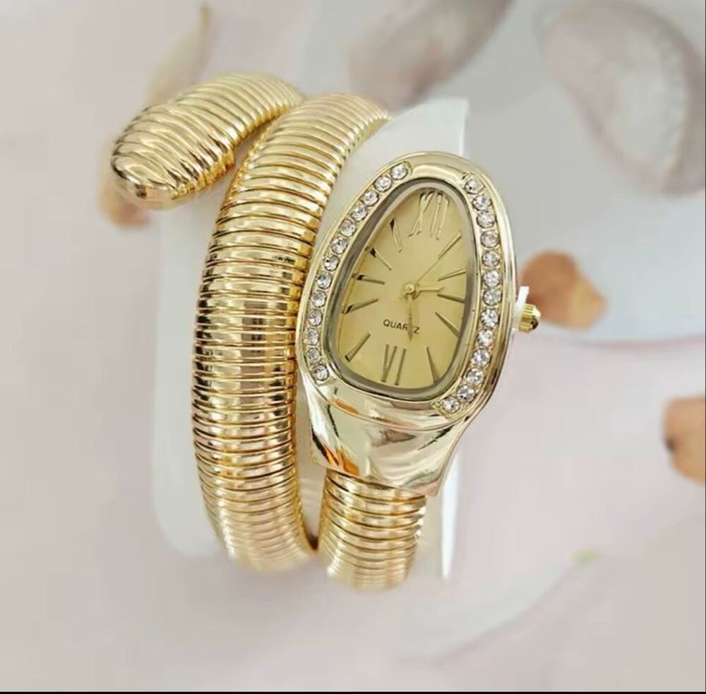 Luxurious Gold Tone Elegant Serpentine Bracelet Watch Crystal Champagne Dial NWO